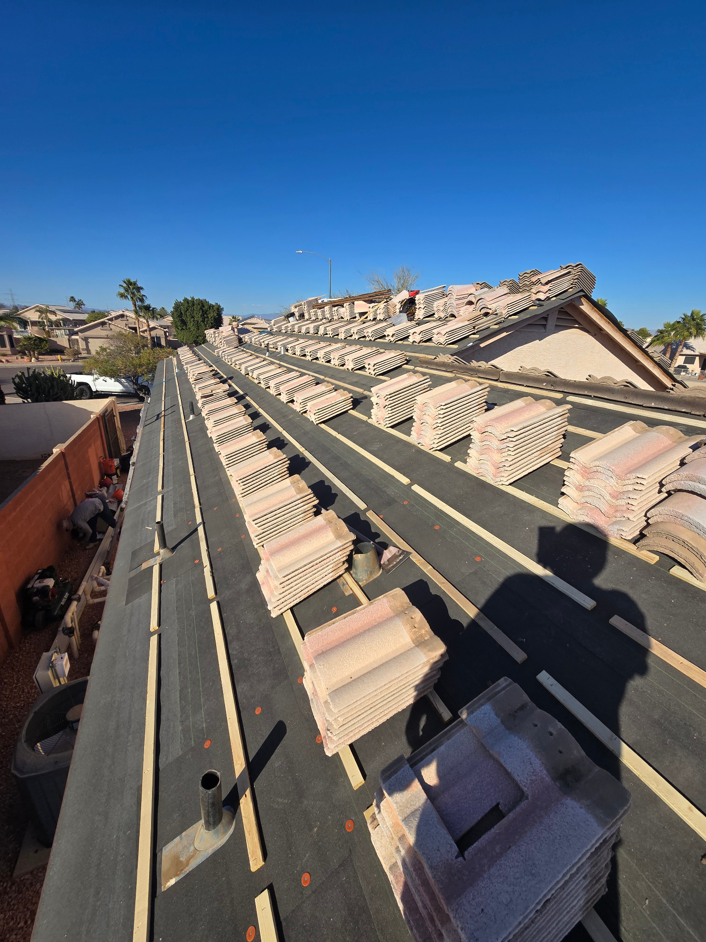 Concrete tile staged on battens over fresh underlayment, Arizona Valley home
