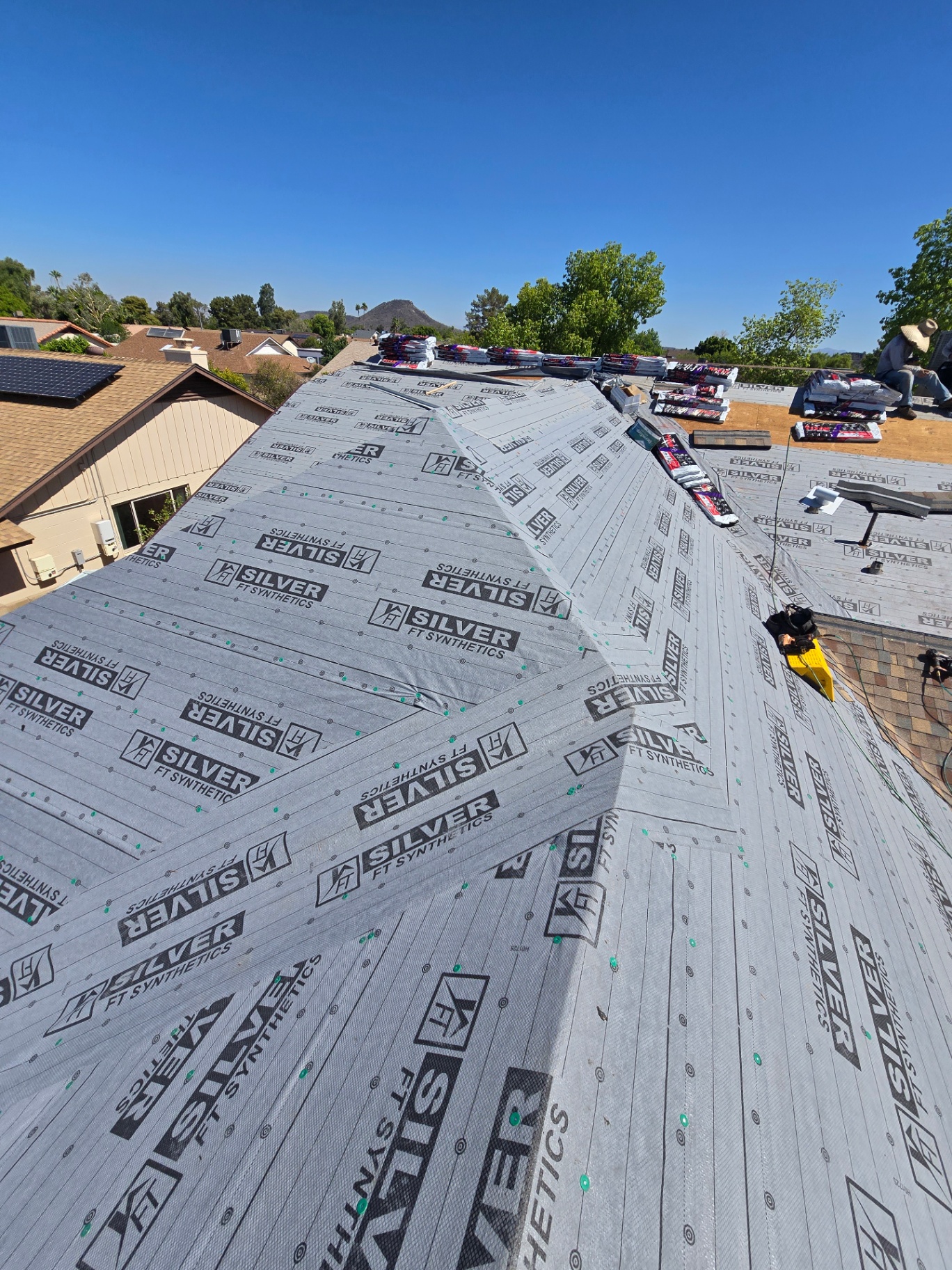 Fresh Silver FT synthetic underlayment installed across a full shingle re-roof