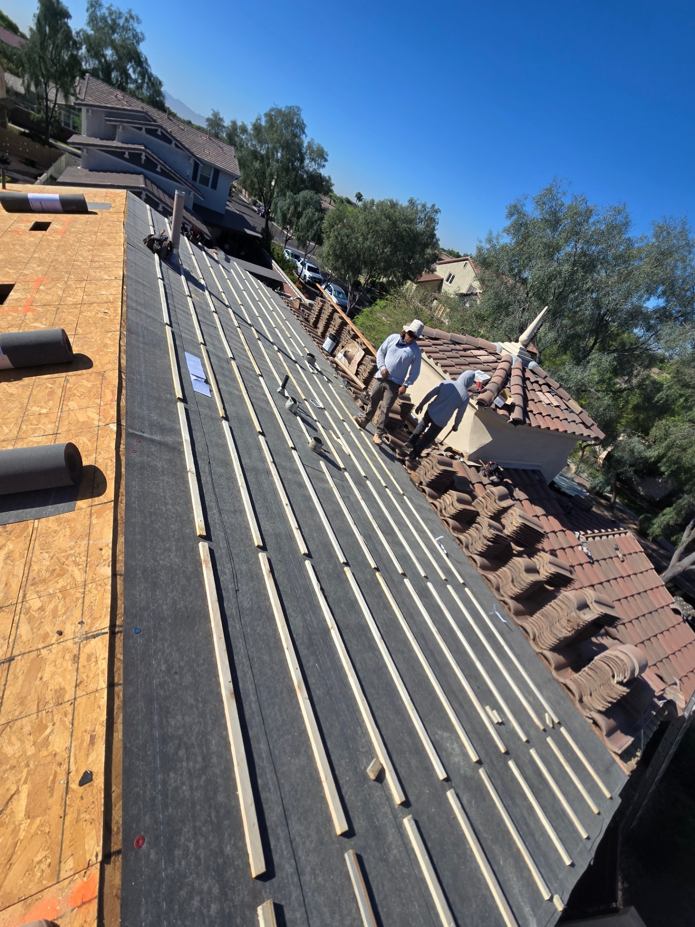 Tile lift and underlayment replacement in progress