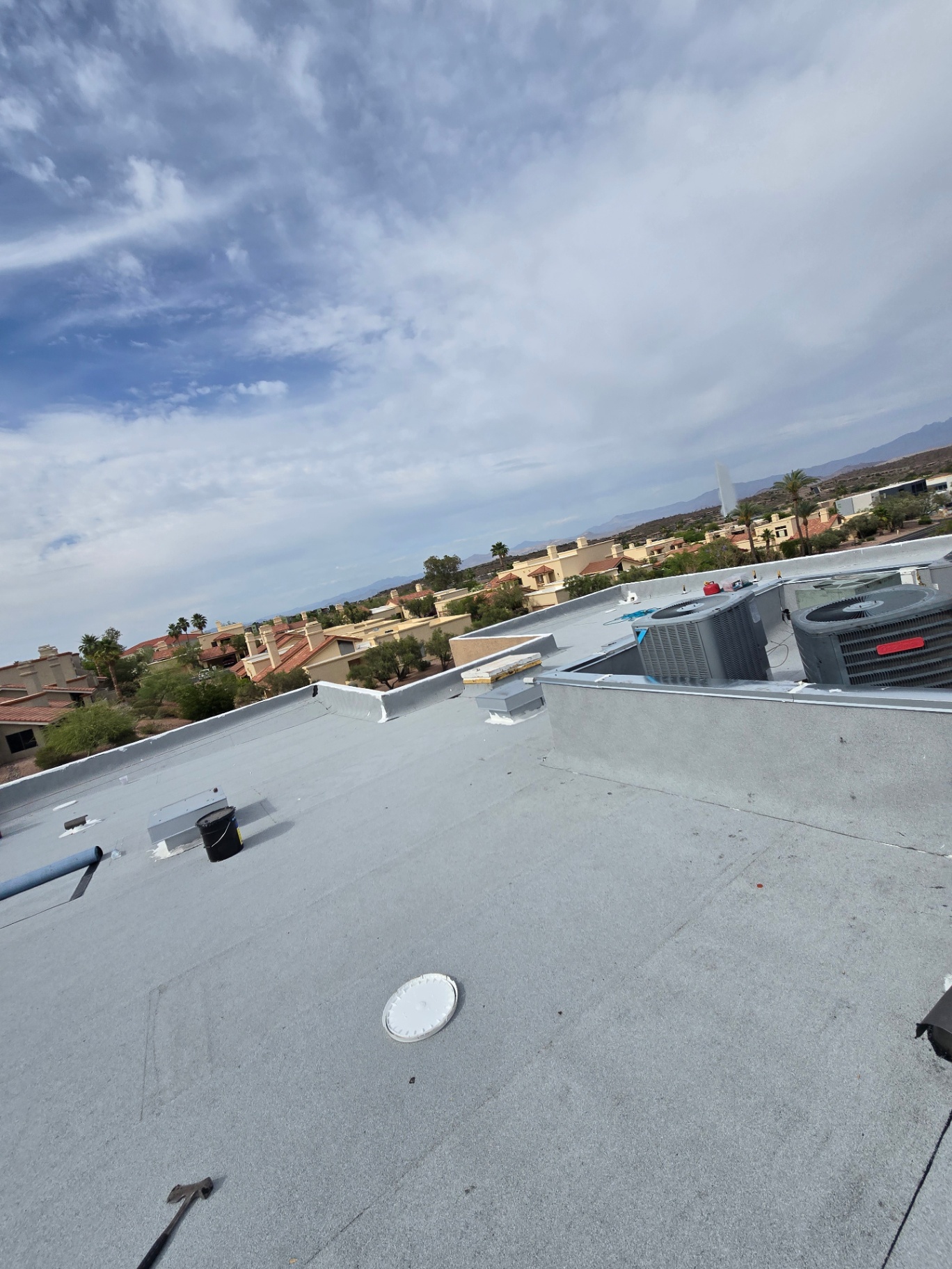 Flat roof replacement with new HVAC curbs and reflective coating in Fountain Hills