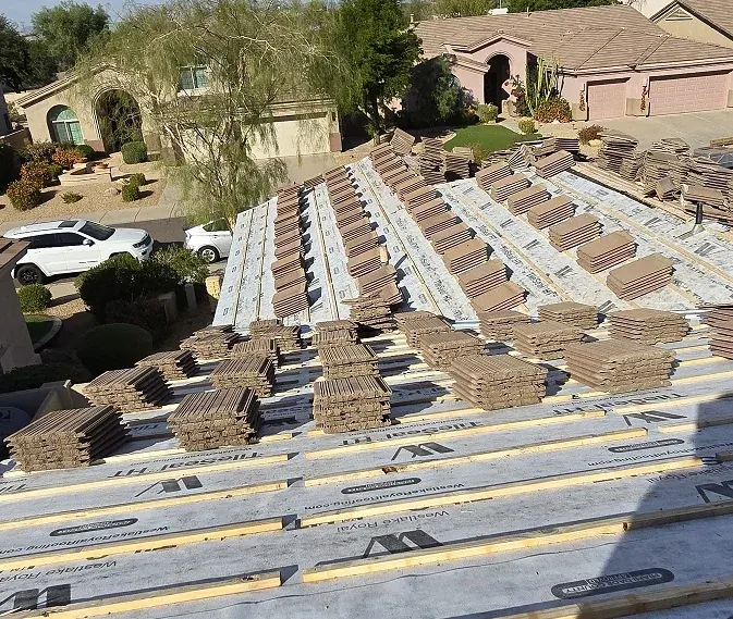 Roof Doc crew working on a tile roof during repair work